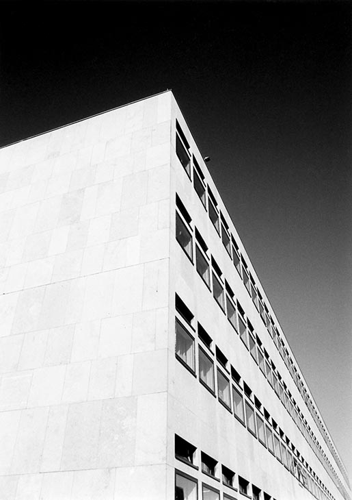 Angular view of Modern Building against dark sky